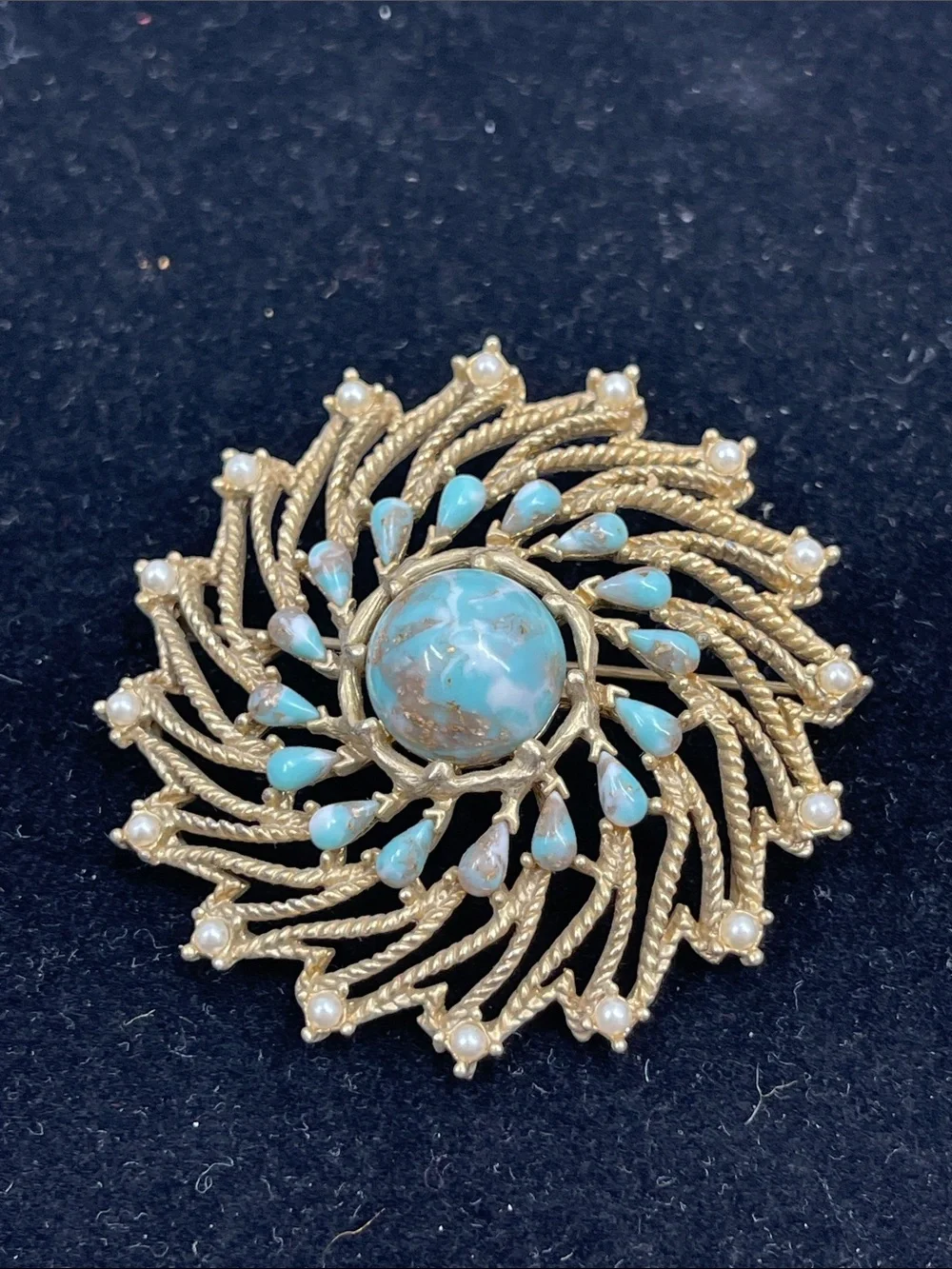 Sarah Coventry Azure Skies Pinwheel Brooch from 1973